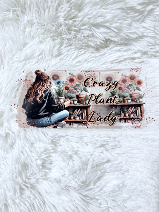 W42. Crazy Plant Lady Sitting On Floor